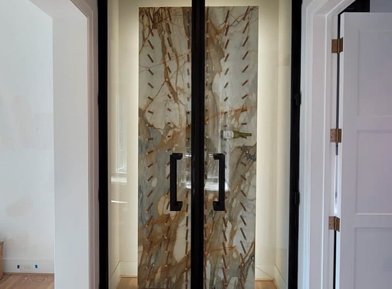 Glass doors with black handles.